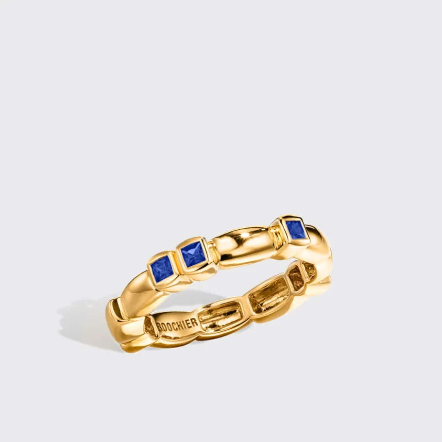 yellow_gold_blue_sapphire_0-3.webp YELLOW GOLD BLUE SAPPHIRE ARCADE ETERNITY RING>Boochier Hot