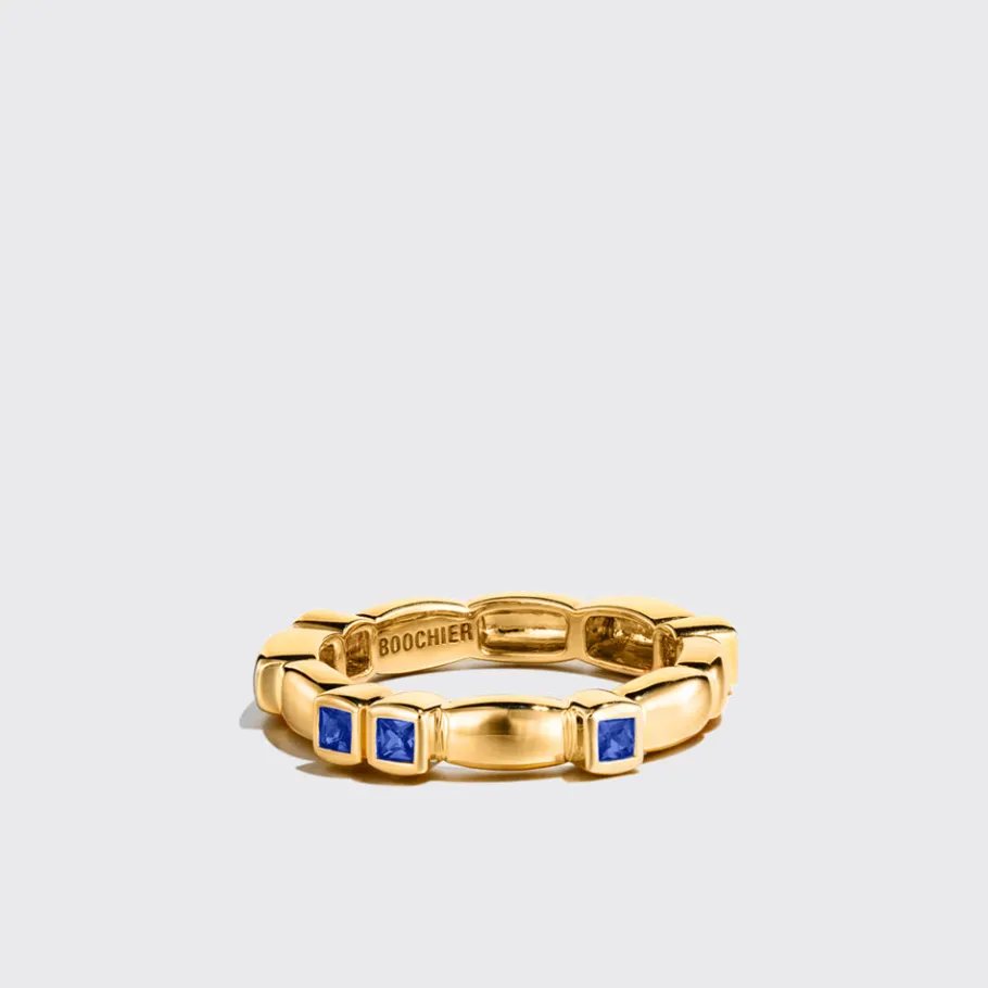yellow_gold_blue_sapphire_1-3.webp YELLOW GOLD BLUE SAPPHIRE ARCADE ETERNITY RING>Boochier Hot